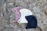 3 items: Single Layer Baby Starter Surprise Pack in XS (3-9 months) and Baby helmet Size